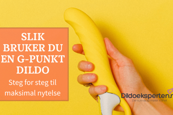 Hånd holder en bøyd, gul G-punkt dildo foran gul bakgrunn med teksten “Slik bruker du en G-punkt dildo – steg for steg til maksimal nytelse”.